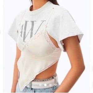 This is a Zara pink mulberry silk and lace bralette. size M